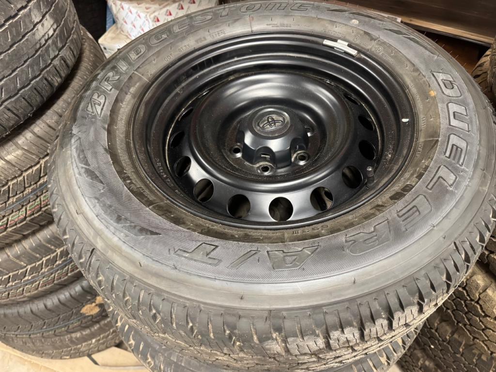 4x Bridgestone Dueler A/T tyres fitted to Toyota Hi-Lux wheels, delivery miles only