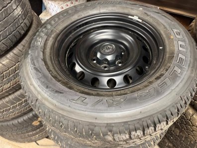 4x Bridgestone Dueler A/T tyres fitted to Toyota Hi-Lux wheels, delivery miles only