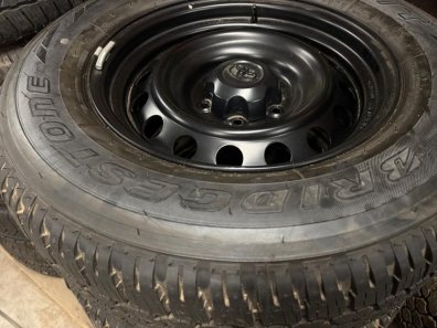 4x Bridgestone Dueler A/T tyres fitted to Toyota Hi-Lux wheels, delivery miles only