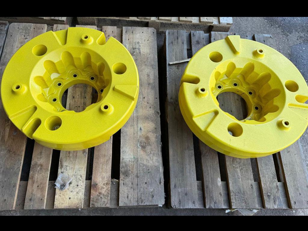 John Deere rear wheel weights, complete with 8 stud carriers, as new