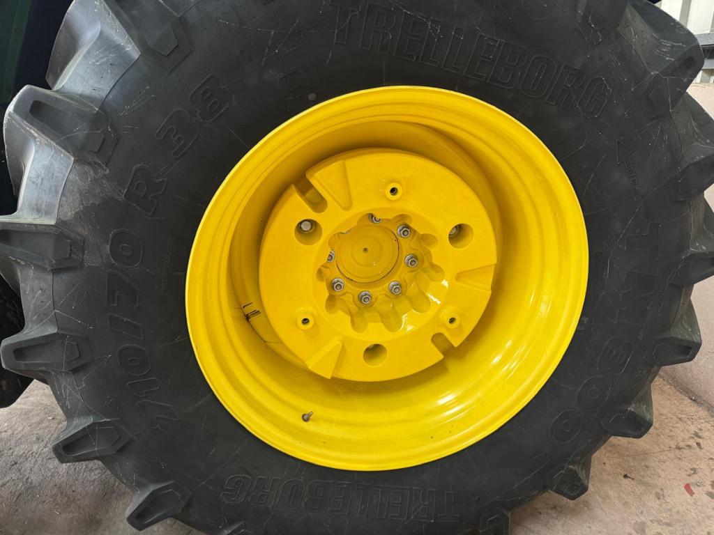 John Deere rear wheel weights, complete with 8 stud carriers, as new