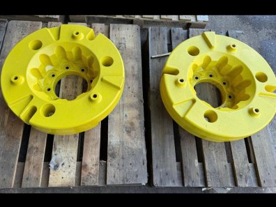 John Deere rear wheel weights, complete with 8 stud carriers, as new