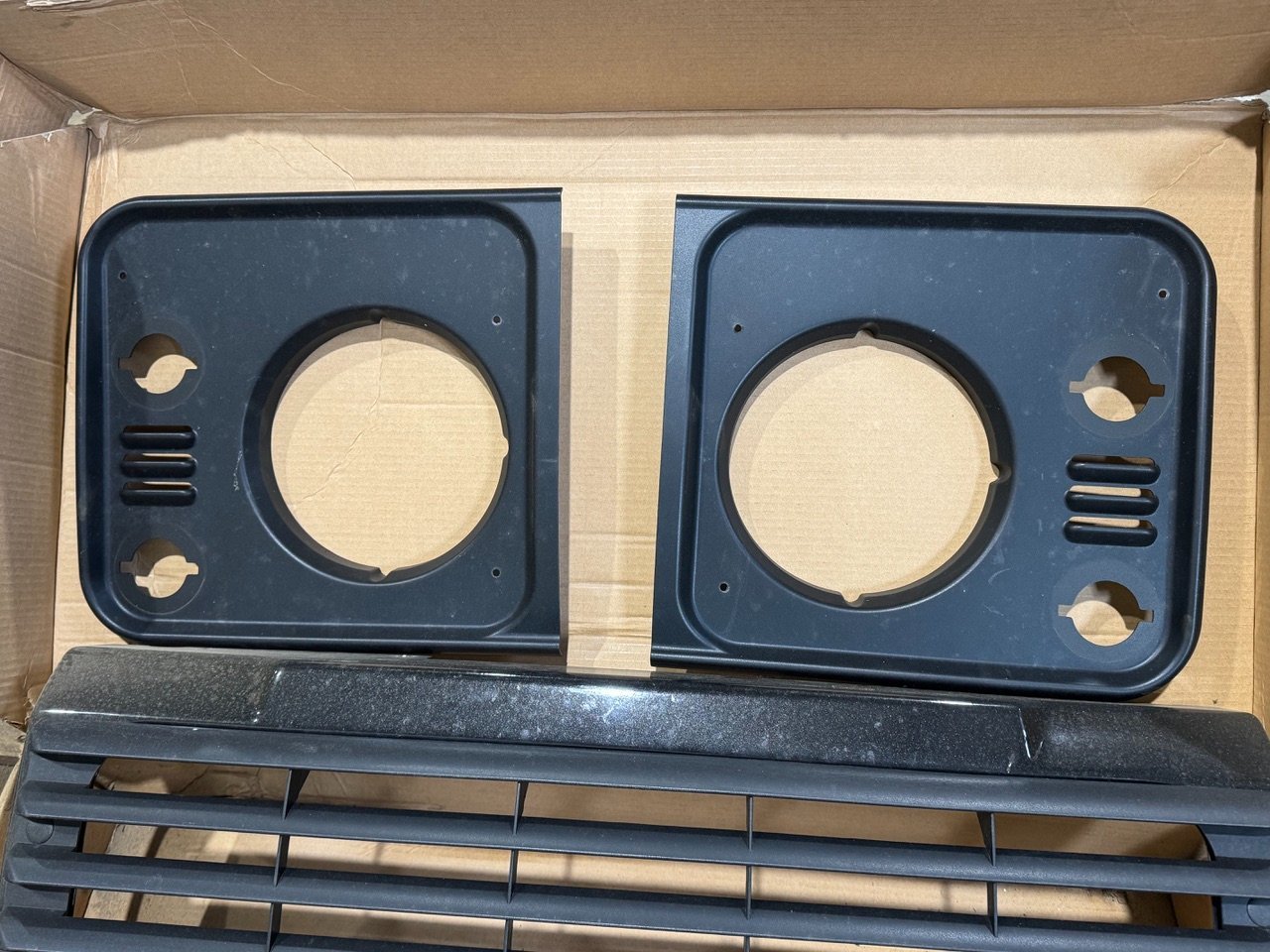 Land Rover 90 parts, front grill and headlight surrounds, front wing side and top vents, headlights, side lights and indicator lenses