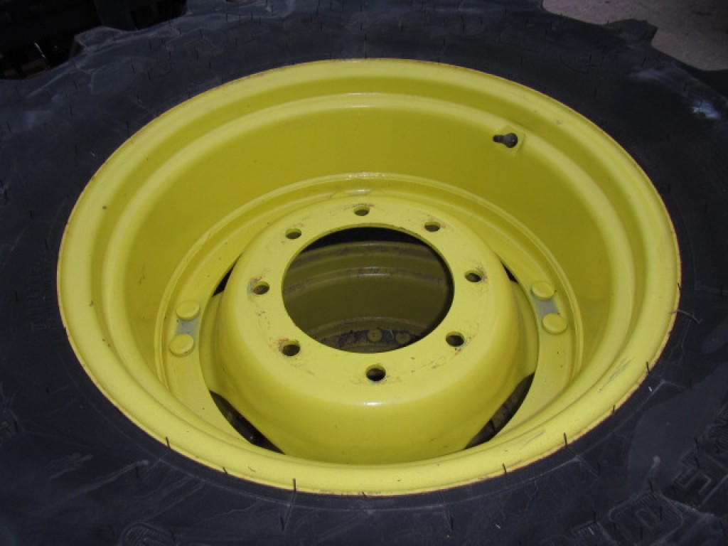 2x 14.9/24 Firestone tyres, fitted to John Deere adjustable wheel