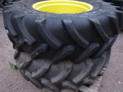 2x 14.9/24 Firestone tyres, fitted to John Deere adjustable wheel