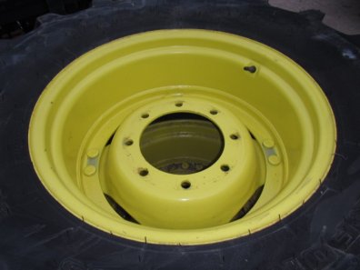 2x 14.9/24 Firestone tyres, fitted to John Deere adjustable wheel