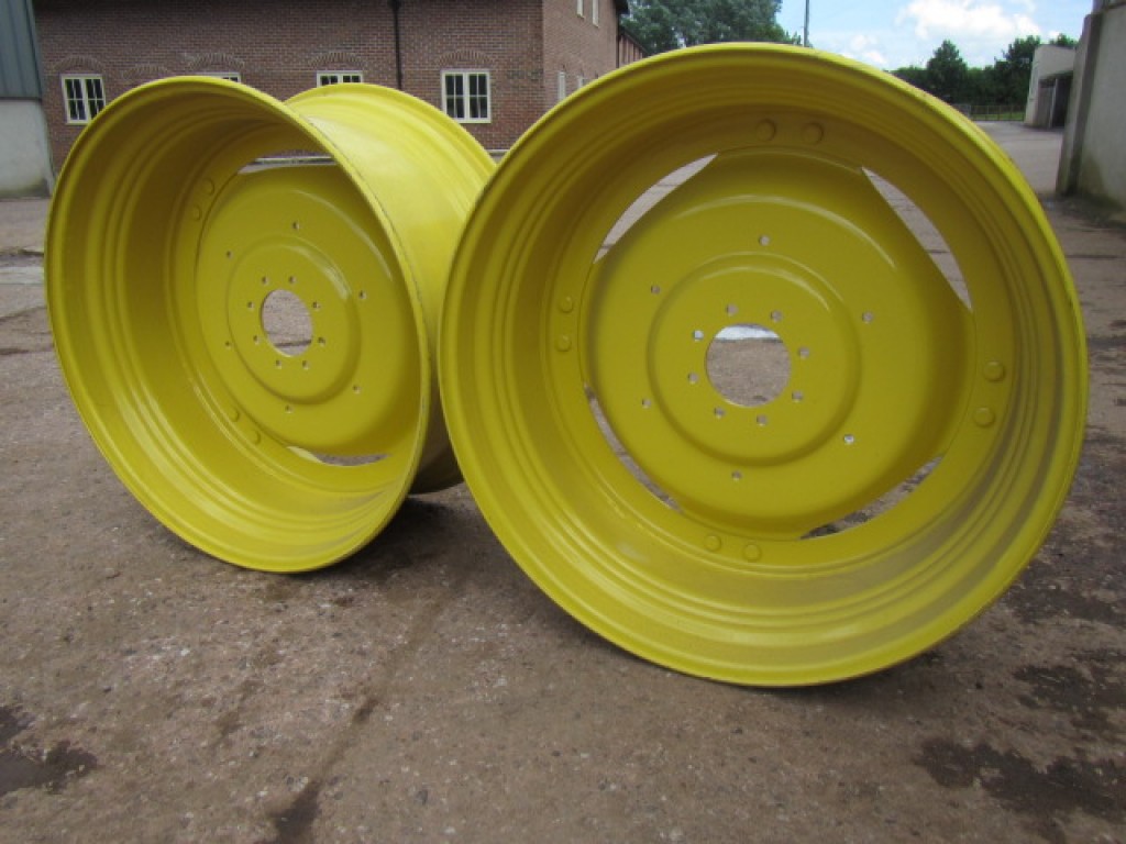 2x new John Deere adjustable 18x38 wheels