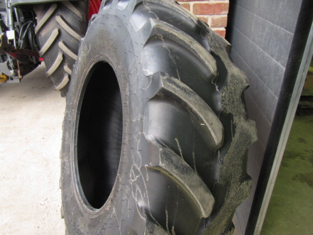1x 16.9/28 Firestone tyre worn on one side