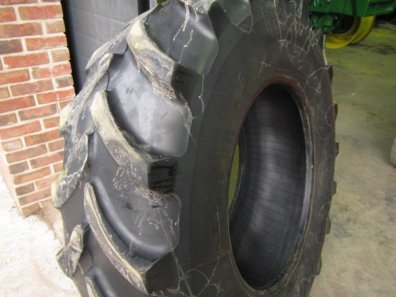 1x 16.9/28 Firestone tyre worn on one side