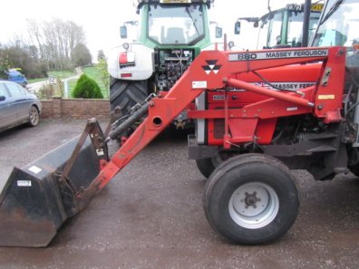 Massey Ferguson 880 loader, brackets to fit a MF390, bucket
