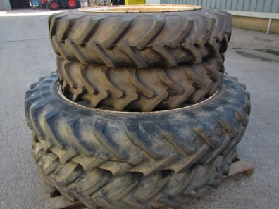 12.4/46 + 11.2/32 row crop tyres fitted to New Holland wheels, to fit a NH TS115