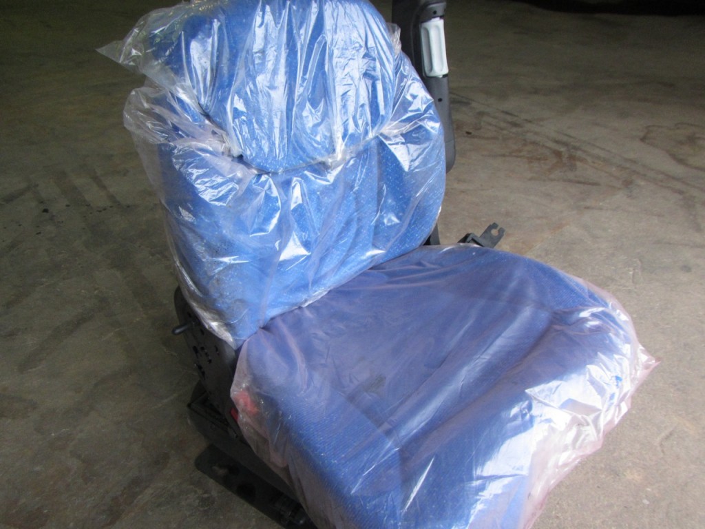 New Holland Tractor seat, New, Air sprung, Complete with left hand arm rest, Manufactured by Grammer