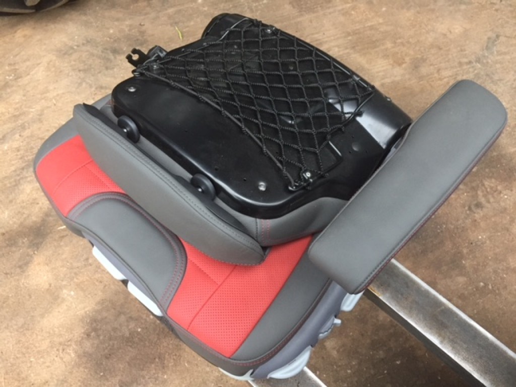 new Case Evolution tractor seat, air sprung, red/grey leather, telescopic headrest, heating switches, complete with left hand armrest, manufactured by Grammer