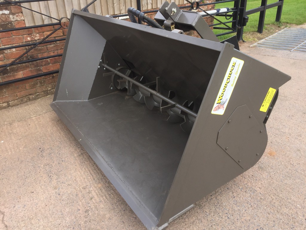 new Woodchuck 80 ST1 bedding dispenser, 1 cube capacity, left/right hand discharge, 3 point linkage system with tipping ram