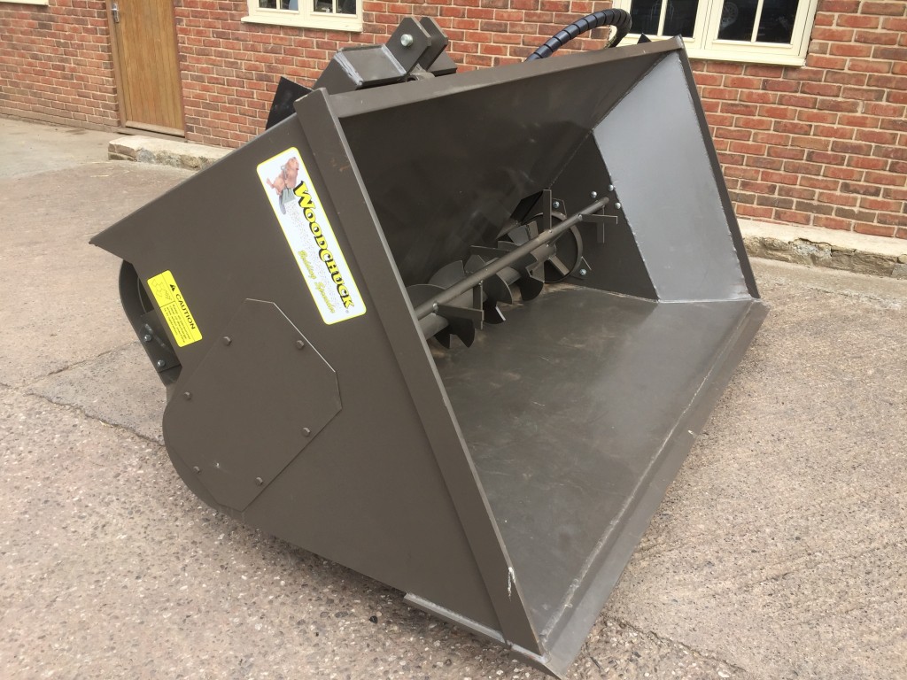 new Woodchuck 80 ST1 bedding dispenser, 1 cube capacity, left/right hand discharge, 3 point linkage system with tipping ram