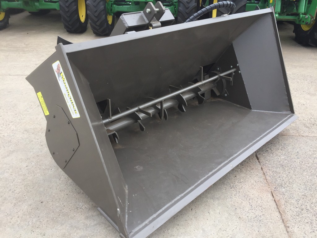 new Woodchuck 80 ST1 bedding dispenser, 1 cube capacity, left/right hand discharge, 3 point linkage system with tipping ram