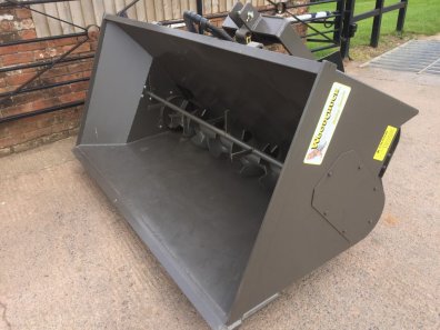 new Woodchuck 80 ST1 bedding dispenser, 1 cube capacity, left/right hand discharge, 3 point linkage system with tipping ram