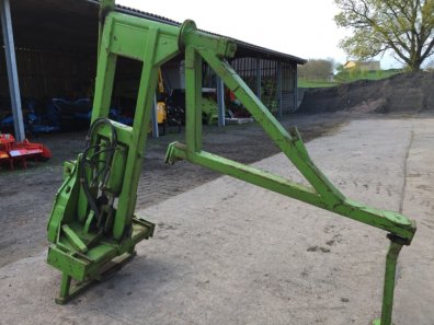 Dowdeswell swing over front press arm