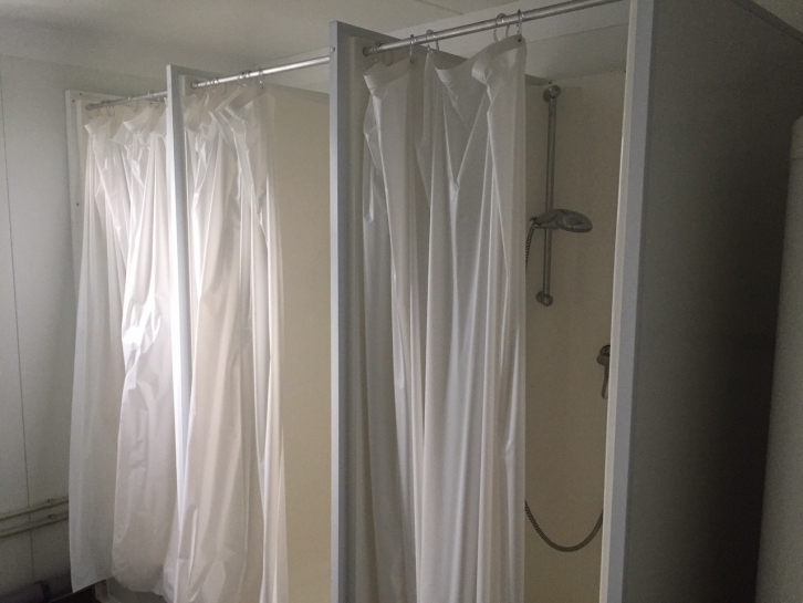 Toilet and shower block