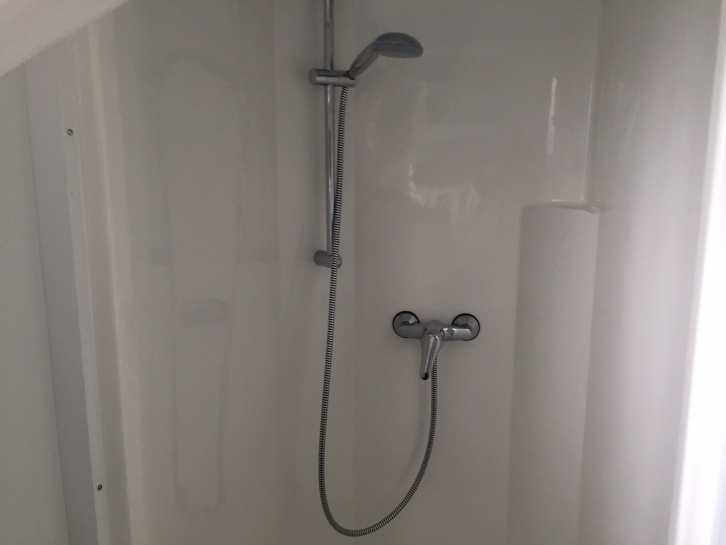 Toilet and shower block