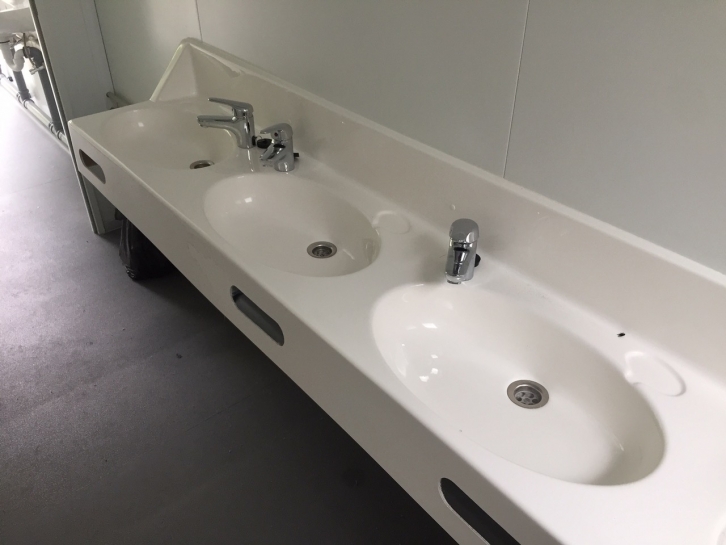 Toilet and shower block