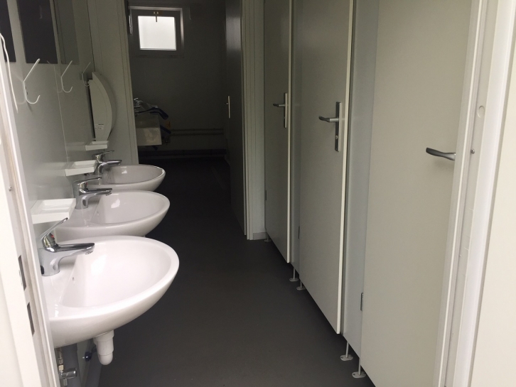 Toilet and shower block