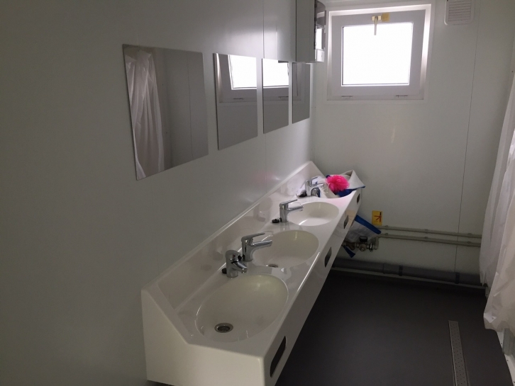 Toilet and shower block