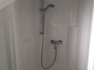 Toilet and shower block