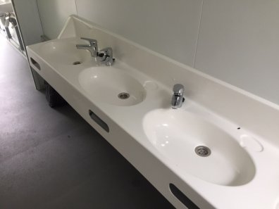 Toilet and shower block