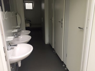 Toilet and shower block