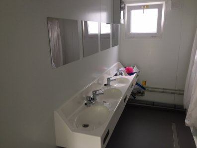 Toilet and shower block
